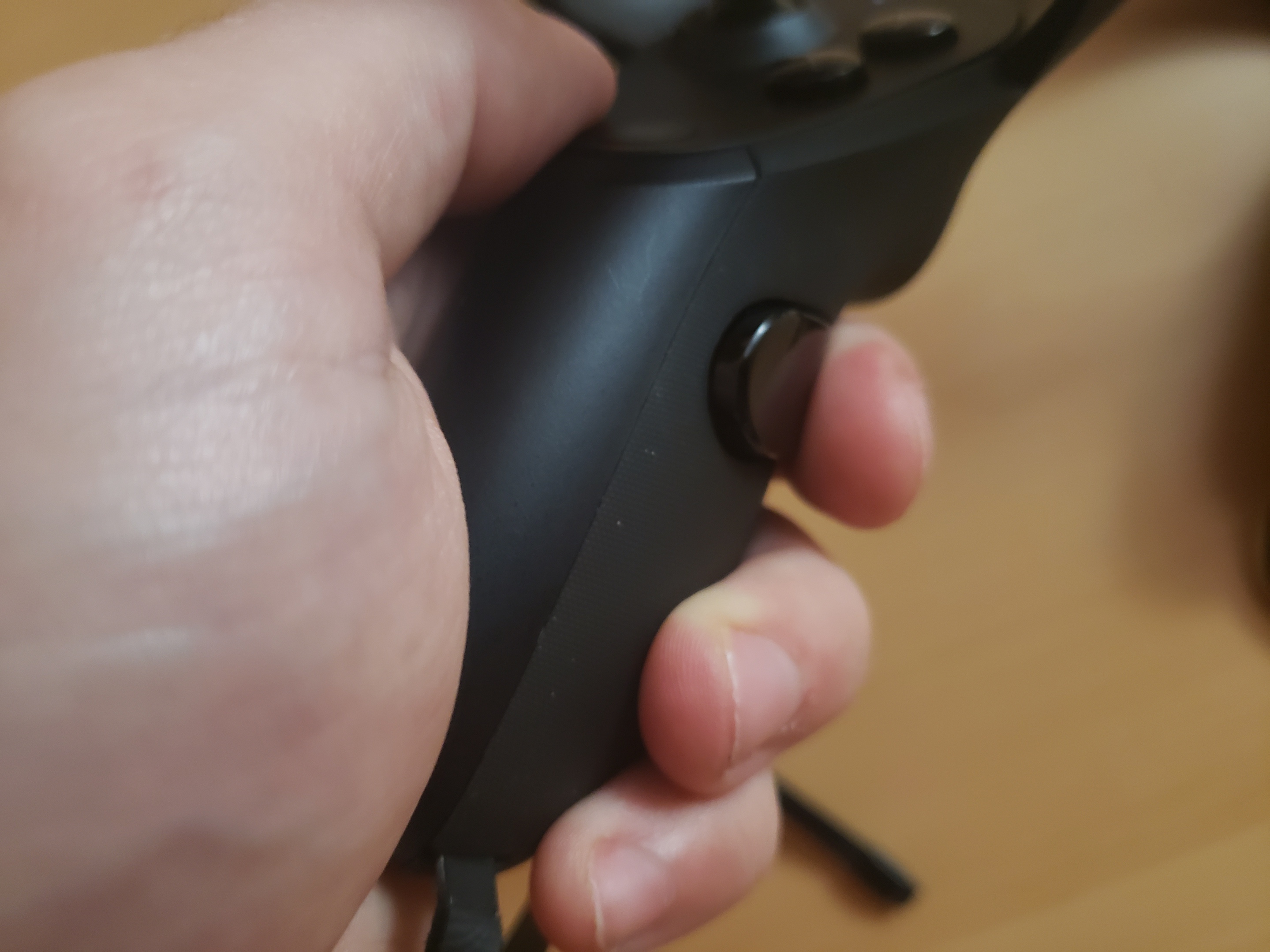 The controller's grip button.